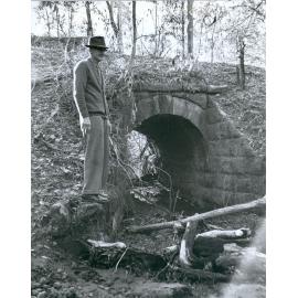 Wulkuraka Station Master at a culvert at Wulkuraka, Ipswich|Ipswich, Queensland, 1965