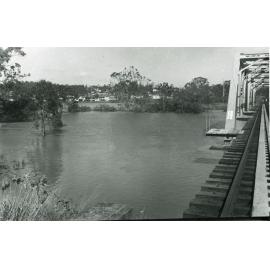 Railway bridge during flooding at Riverview, Ipswich, 1974