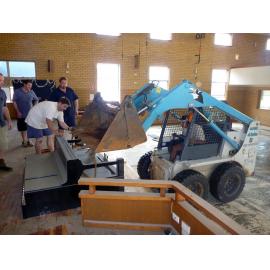 Cleaning up after flood damage at The Salvation Army Church, Bundamba, Ipswich, 2011