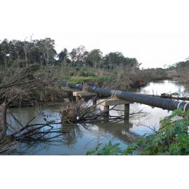 Debris under pipes at Colleges Crossing, Chuwar, Ipswich, 2011