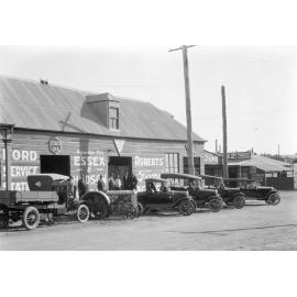 Motor vehicles outside of A. E. Roberts' at the corner of Gordon and Brisbane Streets, Ipswich, 1924
