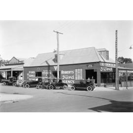Motor vehicles outside of A. E. Roberts' at the corner of Gordon and Brisbane Streets, Ipswich, 1924