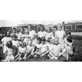 Group of children at fifth birthday party for Norma Jones, Booval, Ipswich, 1940