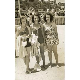 Sisters, Ailsa Duce and Lola Boyle (nee Duce) with a friend at Kirra Beach, on the Gold Coast, Queensland, 1947