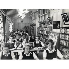 Students in the library at Ipswich Central Girls and Infants School, corner Brisbane and Milford Streets, Ipswich, 1951