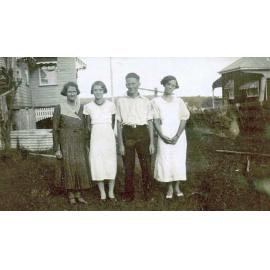Dobbie family near their home at 43 Stafford Street, Booval, Ipswich, 1930s