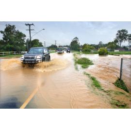 Wet weather conditions caused flooding on Deeging Creek Road, Yamanto, January 2008