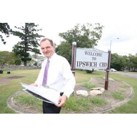 Ipswich mayor Paul Pisasale looks over concept plans to beautify the Ipswich Triangle entrance to the CBD, November 2010
