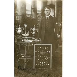 Jack (John) Meekin with trophies from rifle shooting, Ipswich, 1918
