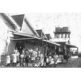 Staff outside butter factory on Jacaranda Street, Booval, Ipswich, 1930s