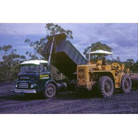 Truck and plant machinery of W. A. Hughes at Rhondda Mine, Bundamba, Ipswich,  c.1970