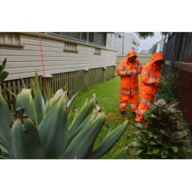 The SES attend to a leaking roof at a Limestone Street property, Ipswich, January 2013