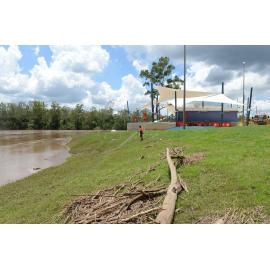 Cleaning up after flooding at Colleges Crossing, January 2013