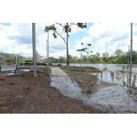 Cleaning up after floods at Colleges Crossing, January 2013