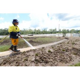 Cleaning after flooding, Colleges Crossing, January 2013