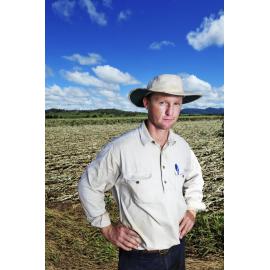 Kalbar farmer Ed Windley with rain damaged corn crop, January 2013