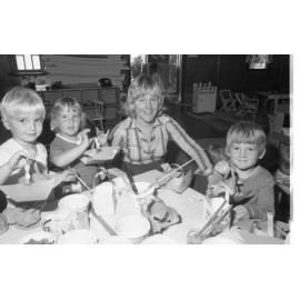 Teacher Dianne Moss (nee Adams) with students at Trinity Kindergarten, North Booval, August 1980