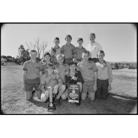Thought to be St Edmund's Hockey Team players and coach with trophy, Ipswich, September 1987