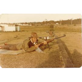 Robert James (Jim) Rush, firing the last shot, Redbank Rifle Range, c.1979