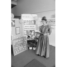 Unidentified woman at the Limelight Festival display for Ipswich and West Moreton Building Society, Ipswich, August 1987