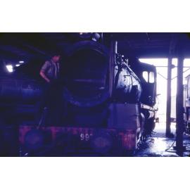 Steam cleaning locomotive at the Ipswich Railway Workshops Roundhouse, North Ipswich, 1969