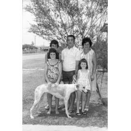 Family with greyhound dog, Ipswich, Queensland, January 1978