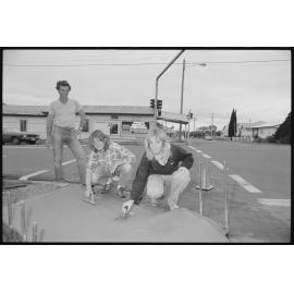Unidentified people doing cementing at the corner of Blackstone Road and South Station Road, Silkstone, August 1985
