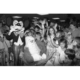Mickey Mouse & Santa Claus at a Christmas party, Ipswich, December 1977