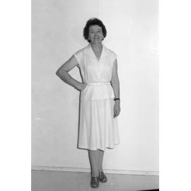 Reid's Department Store model in light blouse and skirt, Ipswich, January 1978