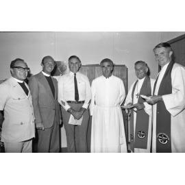 Members of the Uniting Church of Australia induct a new member, Ipswich, Queensland, January 1978