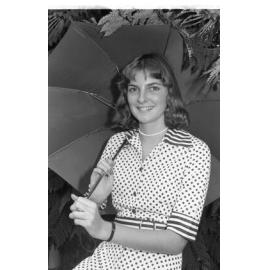 Unidentified woman, thought to be called Helen, in polka dot dress holding an umbrella, Ipswich, February 1978