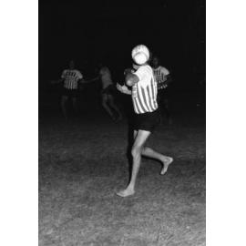 Men playing touch football, Ipswich, November 1977
