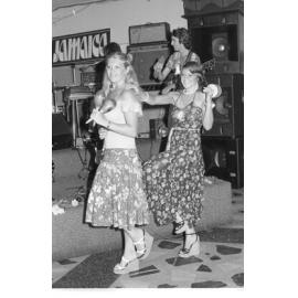Unidentified percussionists playing the maracas, the tambourine, and the cabasa in a band, Ipswich, February 1978