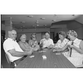 Unidentified group of people playing a card game, Ipswich, Queensland, February 1978