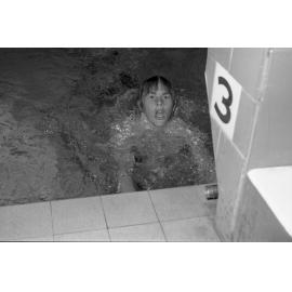 Young man swimming in a pool, Ipswich, February 1978