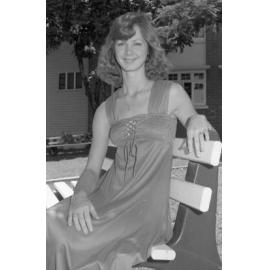 Unidentified young woman posing in Memorial Gardens, Ipswich, February 1978