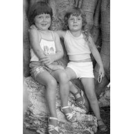Two unidentified children under a Moreton Bay Fig Tree at Queens Park, Ipswich, February 1978
