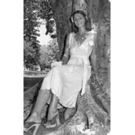 Unidentified woman posing for Valentine's Day photographs in Queens Park near tennis courts, Ipswich, February 1978