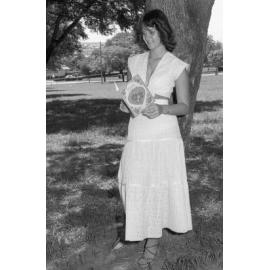 Unidentified woman posing with Valentine's Day card in Queens Park, Ipswich, February 1978