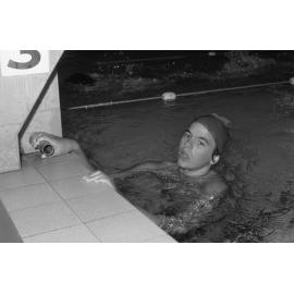 Unidentified swimmer at a starting block, Ipswich, Queensland, February 1978