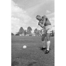 Man hitting golf ball, Ipswich, November 1977
