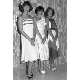Models advertising dresses, Ipswich, November 1977