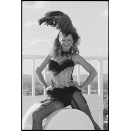 Unidentified Burlesque dancer standing on the Denmark Hill Water Tower, Ipswich, July 1985