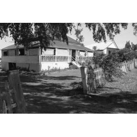 Federation style queenslander with iron railing, Ipswich, November 1977