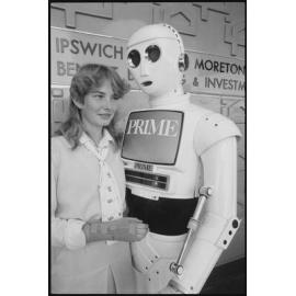 Prime Computer mascot with Ipswich & West Moreton Building Society employee, Ipswich, July 1985