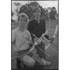 Two young men with archery bows and arrows, Ipswich, July 1985
