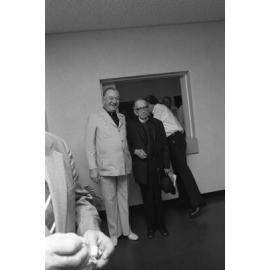 Rev. Dr. O. K. Oxenham and unidentified priest attending the reopening of St Mary's Hall after refurbishment, Woodend, Ipswich, Queensland, February 1978