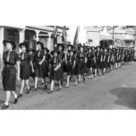 Ipswich Girl Guides in ANZAC Day Parade, Nicholas (?) Street, Ipswich, 1957