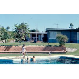 Swimming pool in the backyard of a home in Ipswich, 1969