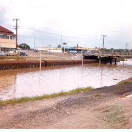 Train at back of Ipswich Railway Station during flood, Ipswich, 1974